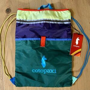 NWT Cotopaxi Tago Drawstring Backpack Del Día Multicolor One-of-a-Kind Eco